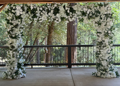 Full Daydream arch rental with white roses, hydrangea, greenery at outdoor redwood forest wedding venue | Reno, Lake Tahoe & Sacramento