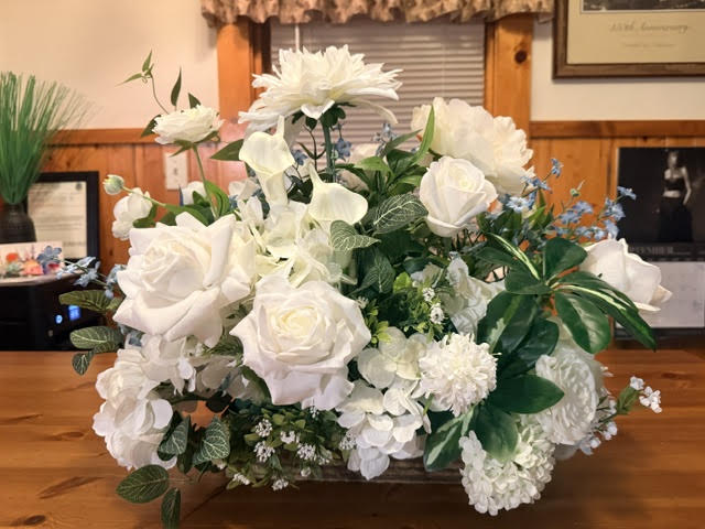 Enchanted Centerpiece close-up with white rose and blue delphinium