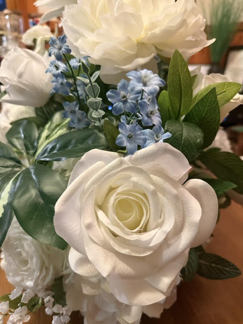 Enchanted Centerpiece close-up detail with blue floral accents