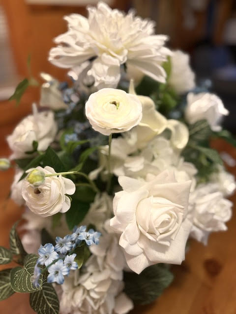 Enchanted Centerpiece wide view showing full arrangement volume with blue accents