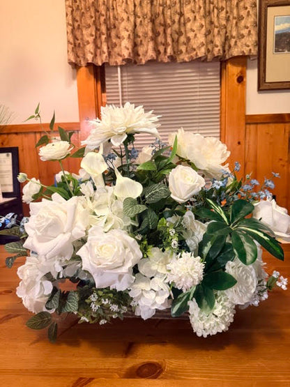 Enchanted Centerpiece with blue delphinium accents, angled view