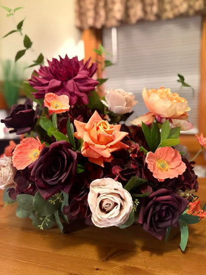 Evermore Centerpiece wide shot showing full height and volume with burgundy and plum florals