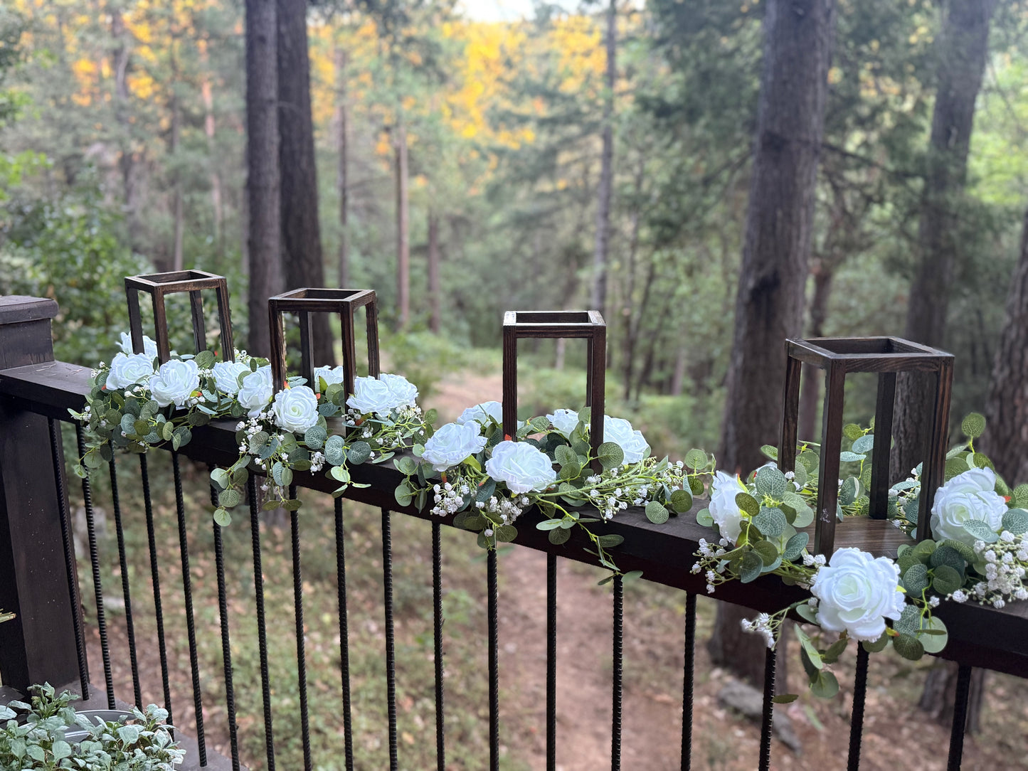 (4) Wood Structure Centerpieces Surrounded with White Faux Roses and Greenery with White Candles