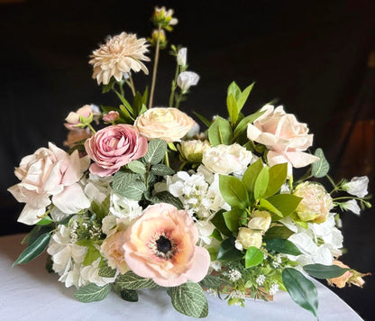 Large Love Story Centerpiece, wide shot on white tablecloth