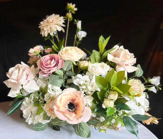 Large Love Story Centerpiece, wide shot on white tablecloth
