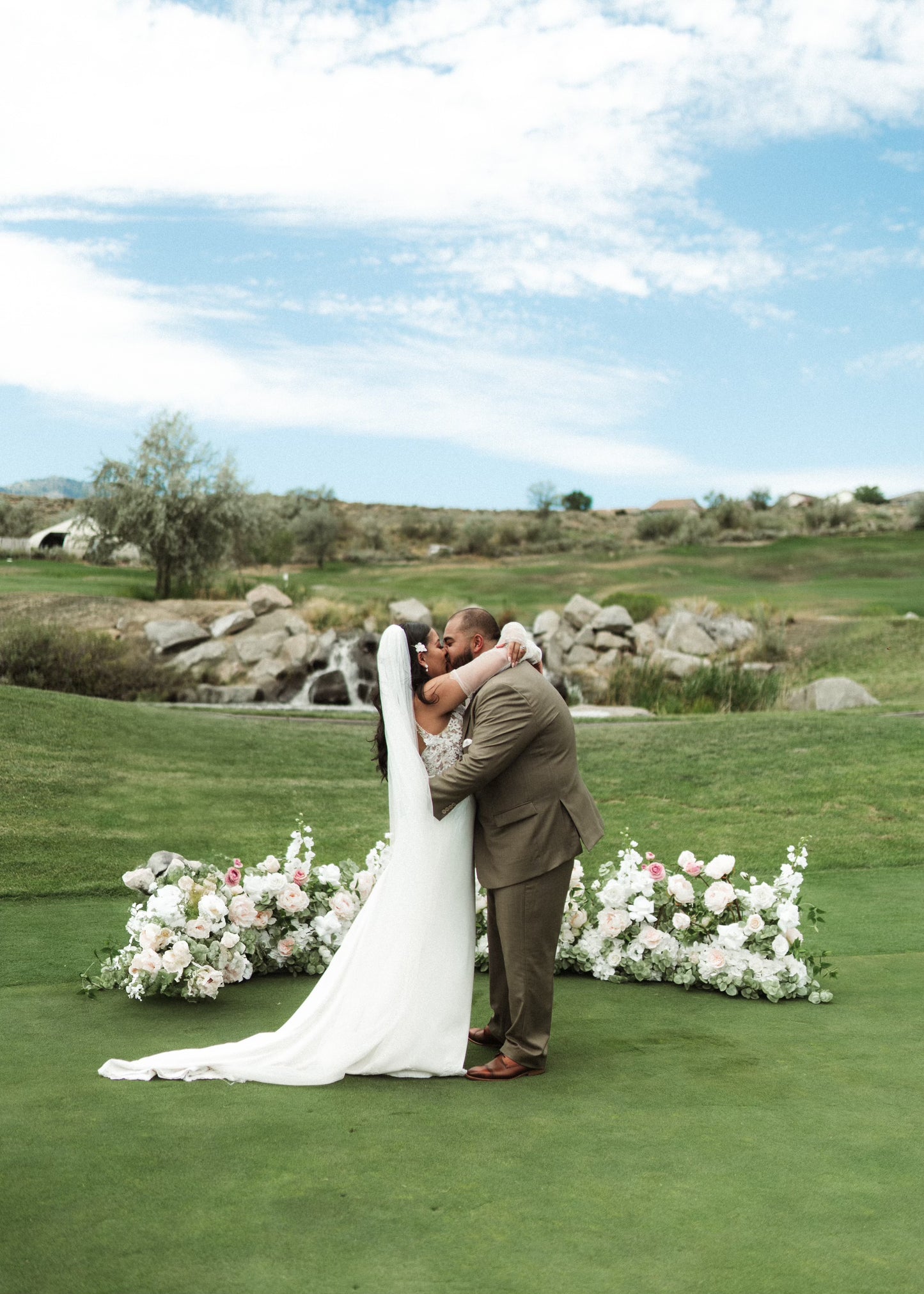 Blush and white aisle flower rental cluster with roses, hydrangea, and eucalyptus lining outdoor wedding ceremony aisle | Reno, Lake Tahoe & Sacramento