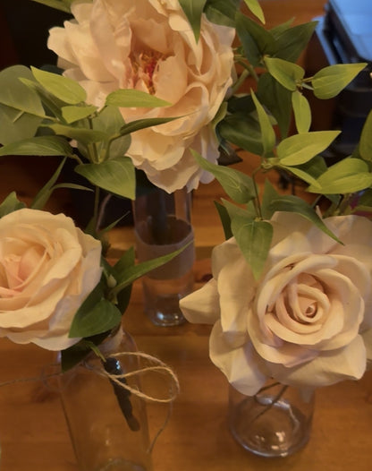Close-up of blush rose and Pink Peony and pink rose bud centerpiece rental with eucalyptus in crystal bud vase in soft natural light | Reno, Lake Tahoe & Sacramento