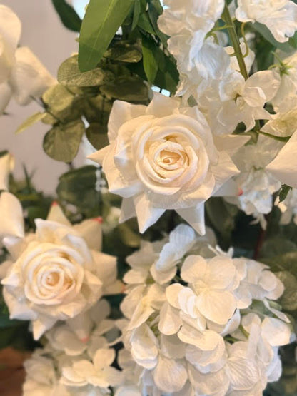 Macro close-up of Enchanted aisle flower rental blooms with cream white garden roses, white hydrangea, and white delphinium with lush eucalyptus | Reno, Lake Tahoe & Sacramento